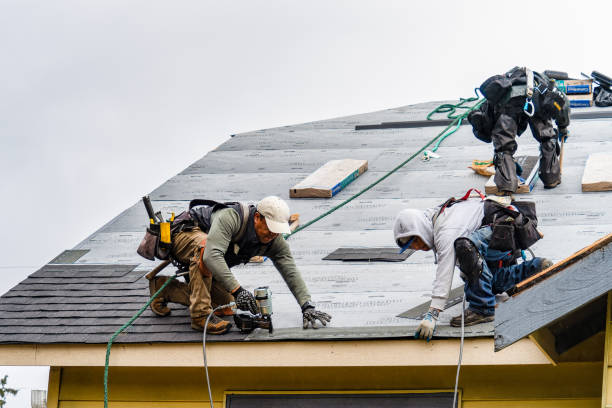 Professional Gutter Installation technician working in Bellevue, OH